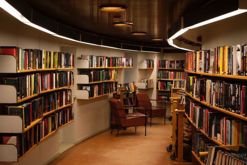 Two chairs in a hidden nook of a library