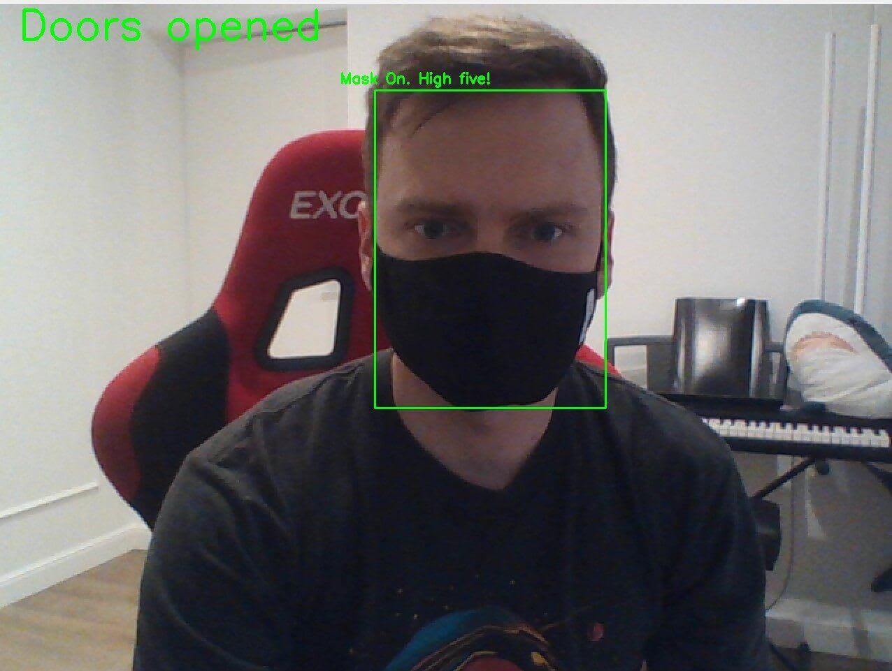 A picture of Piotr with his mask on and the algorithm successfully detecting it